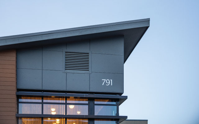 Modern architectural detail of Echelon residence in Bentonville, featuring sleek design, large windows, and prominent house number 791, reflecting the community's commitment to contemporary living.